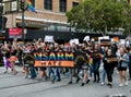 Marchers hold a `Disarm Hate` banner at 2017 San Francisco Pride Parade